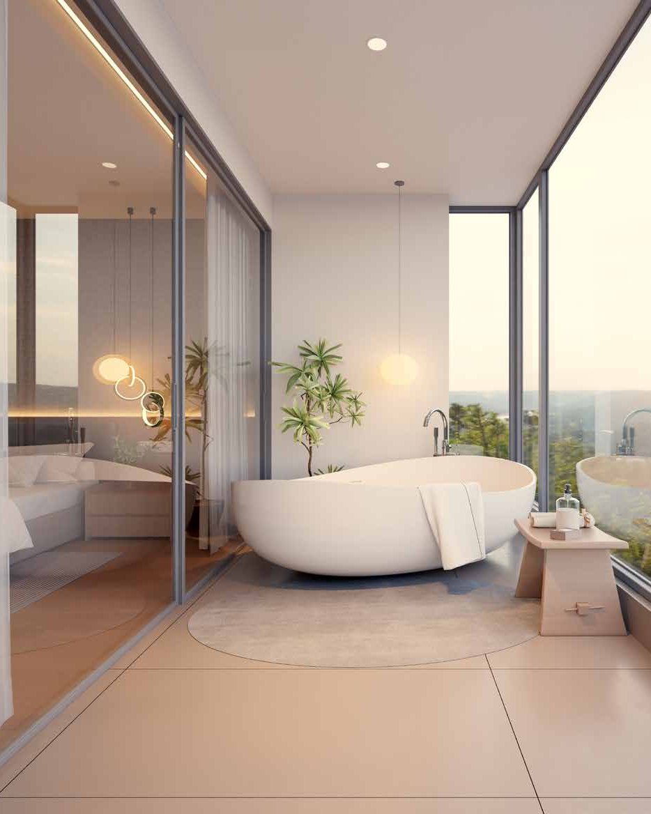 Freestanding bathtub by floor-to-ceiling windows with a green view